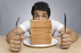 Man Eating Sliced Bread