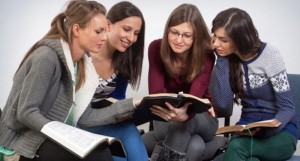 Young-woman-teacher-teach-Gods-Words-to-a-women-team-Shutterstock-800x430